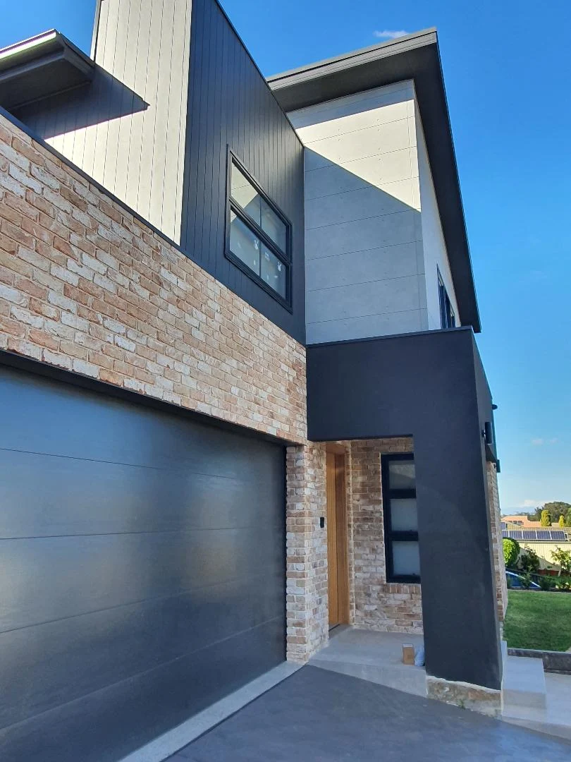 Modern house with mixed materials and angular design