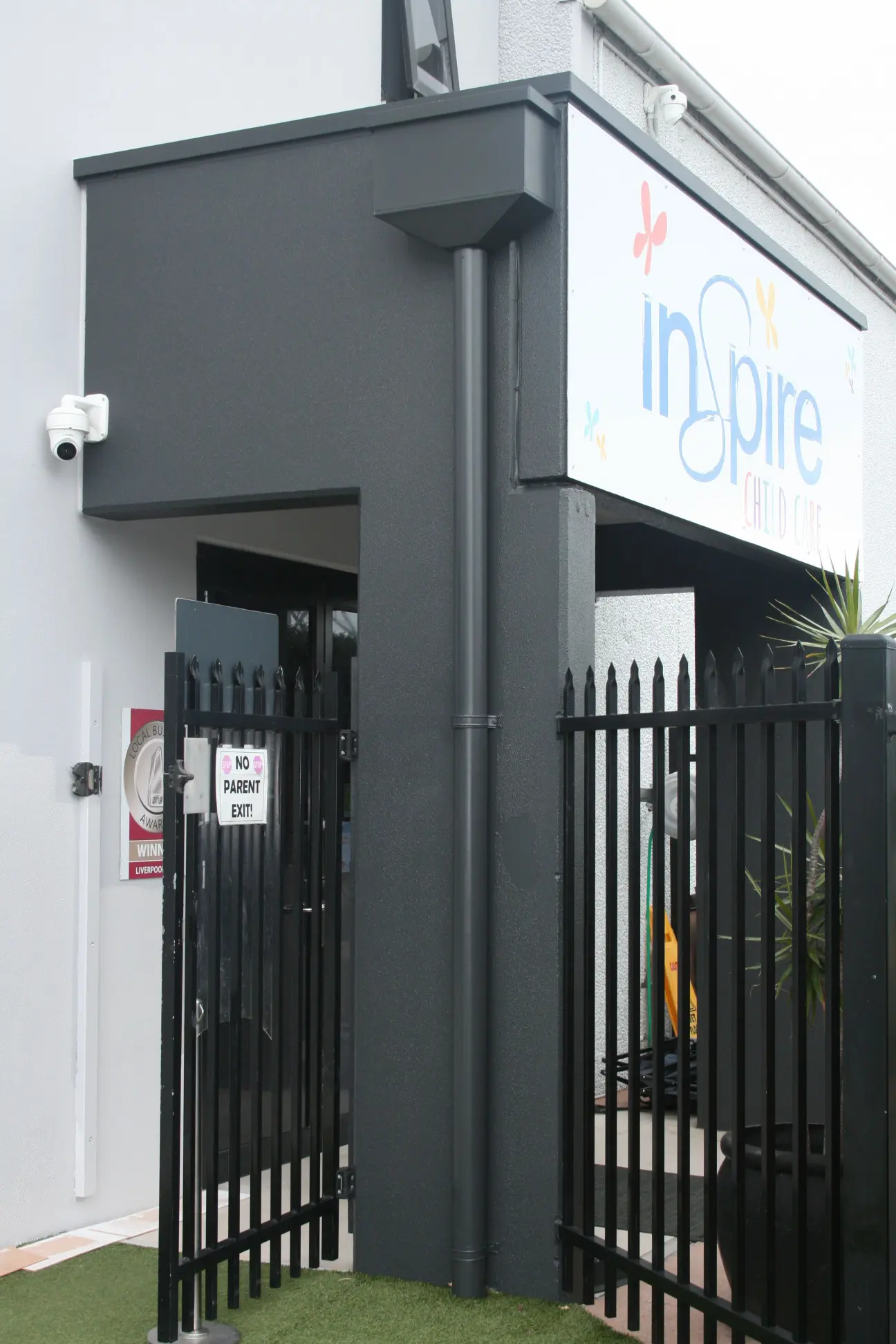 Inspire Child Care center entrance with security gate