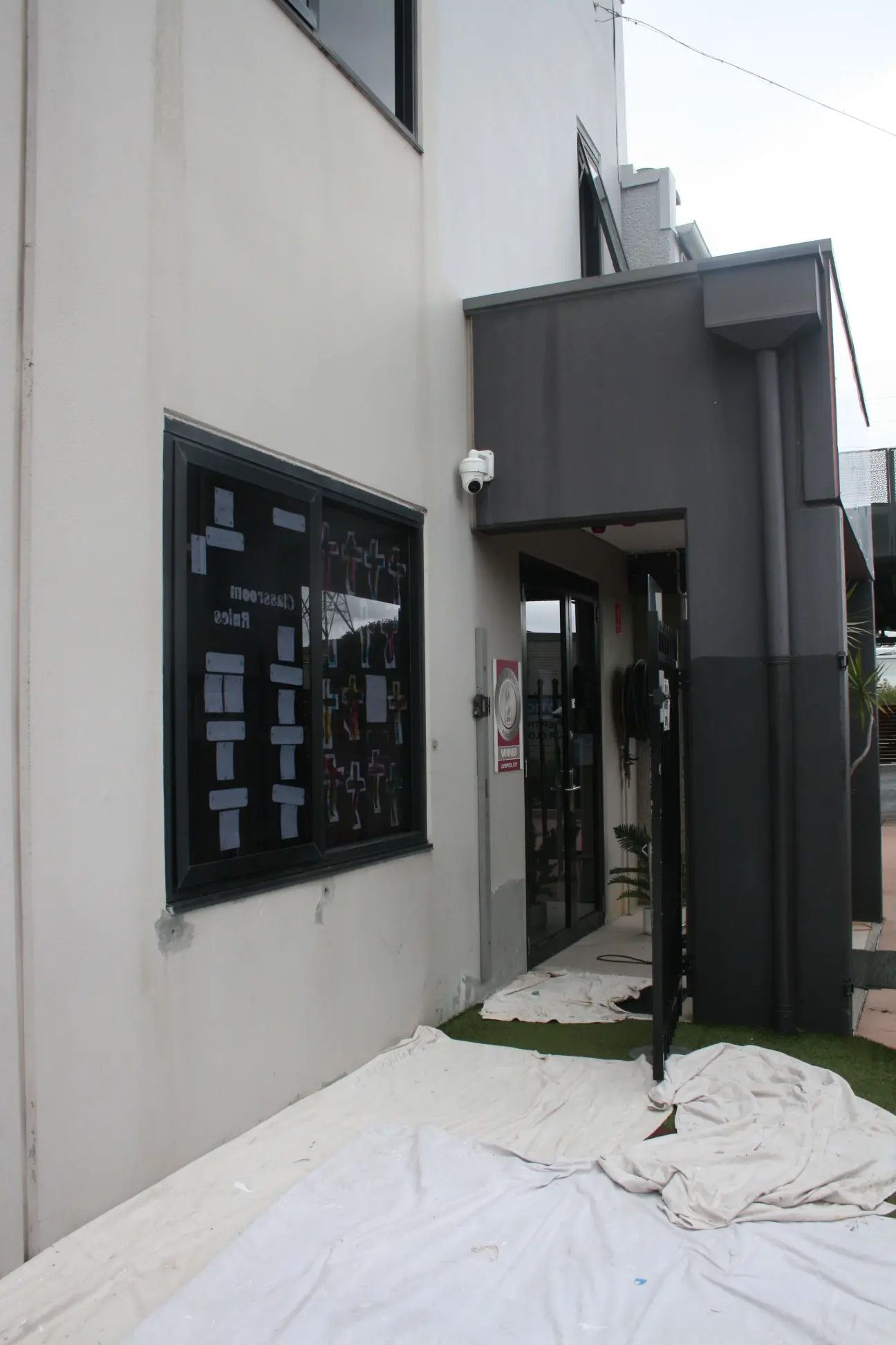 Modern building exterior with open doorway