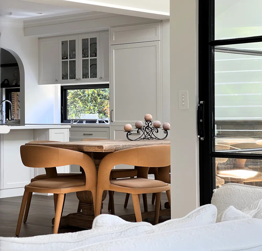 Modern Australian kitchen with stylish wooden dining set